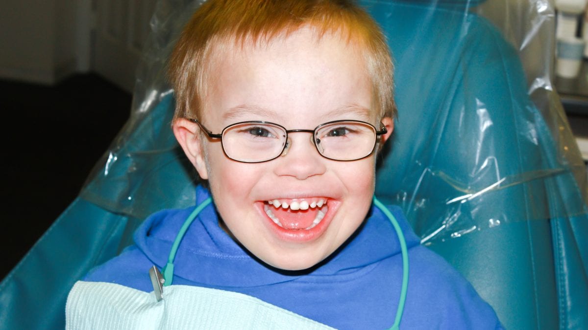Boy With Down Syndrome at Dentist