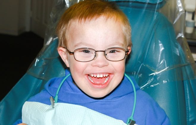 Boy With Down Syndrome at Dentist