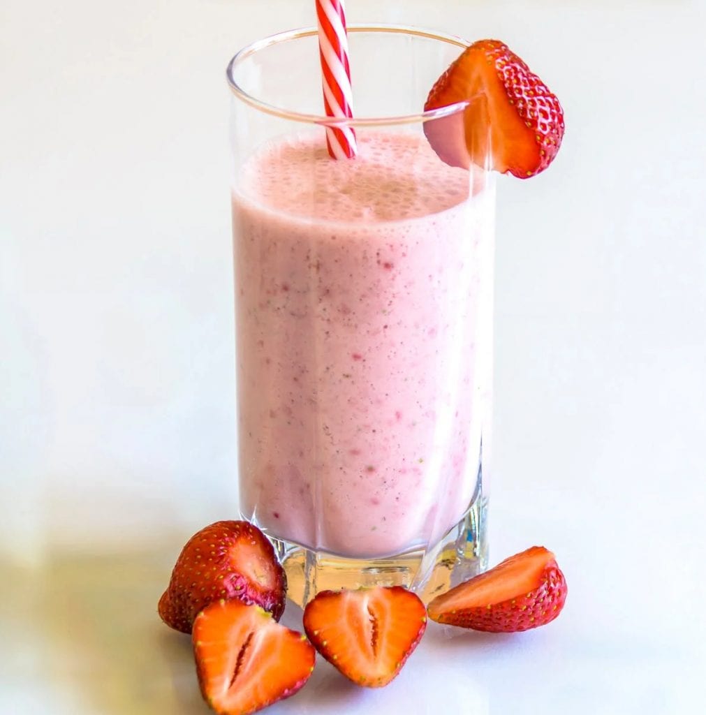 strawberry smoothie with straw