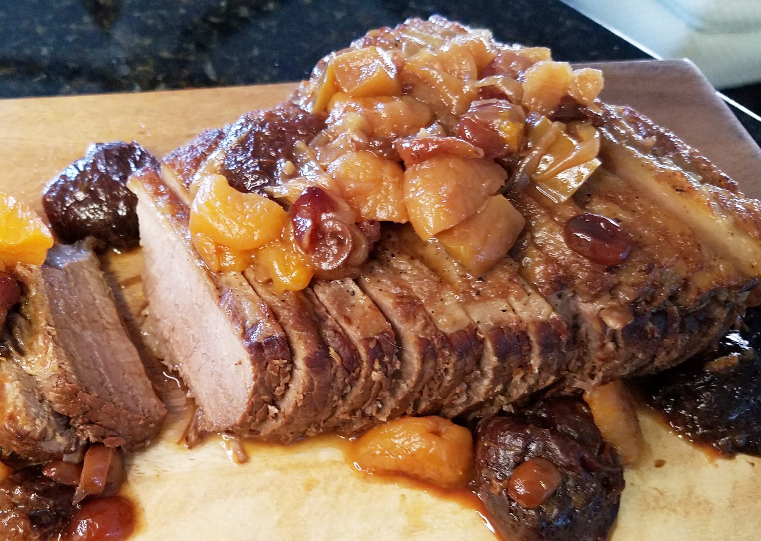 fruited brisket on cutting board