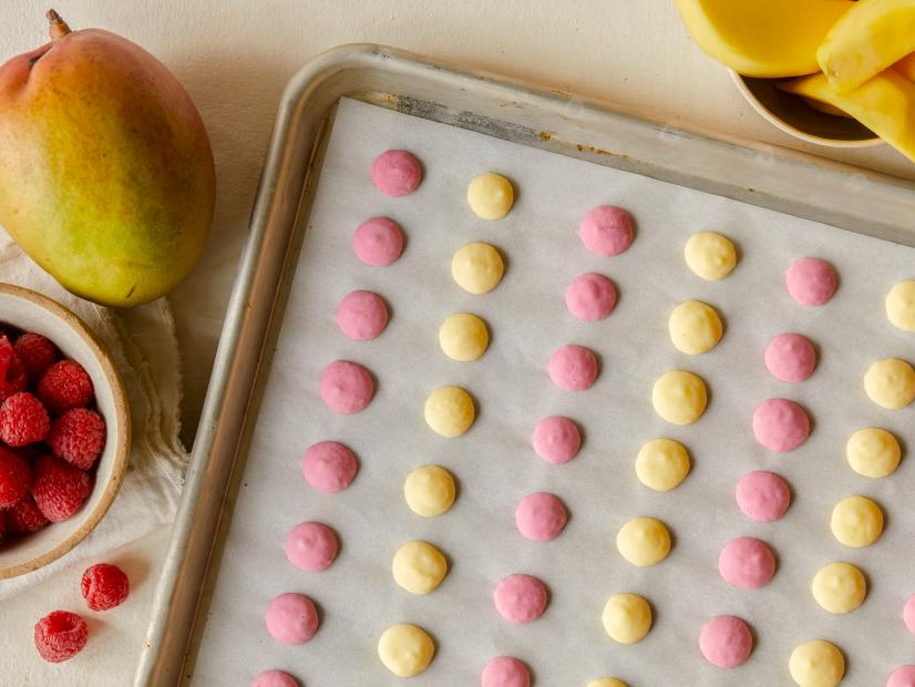 frozen yogurt dots on a baking sheet