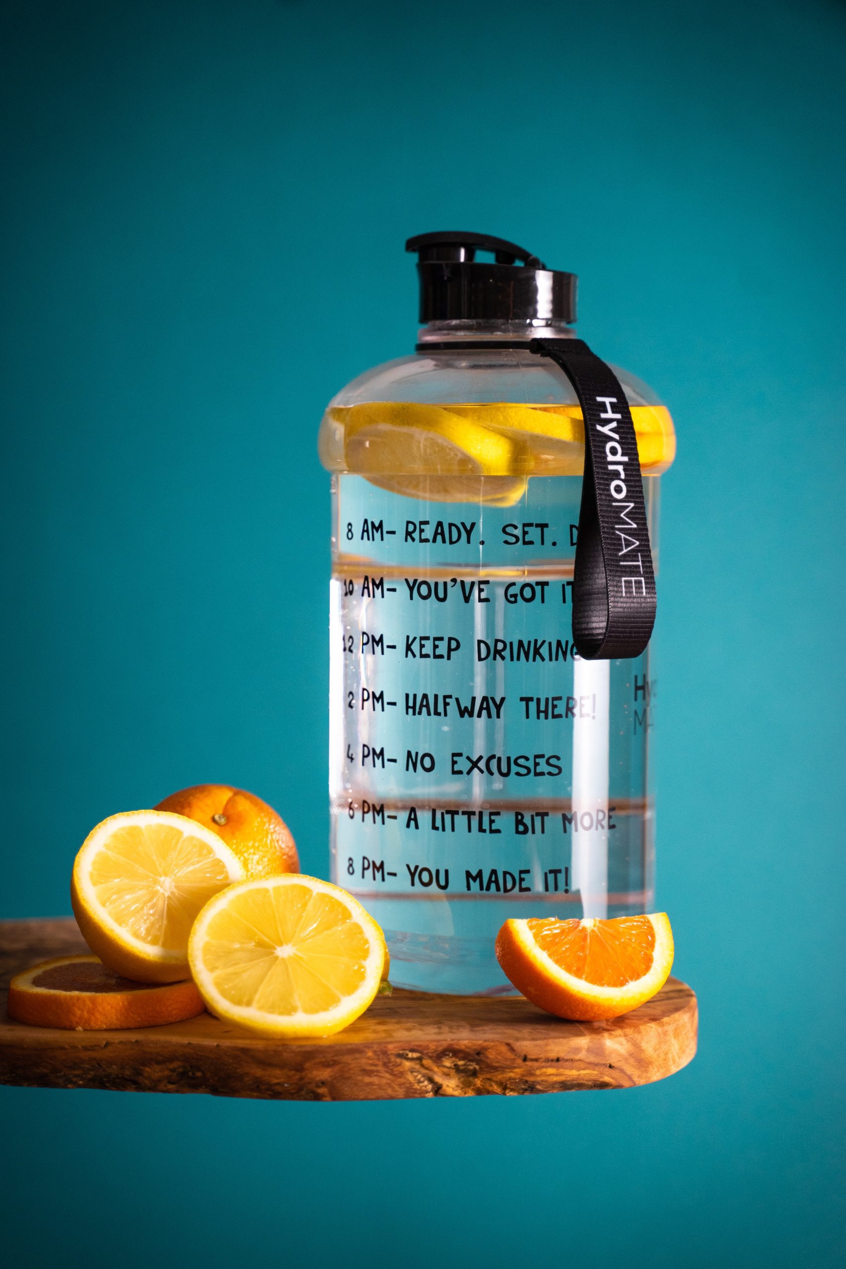 water bottle with lemon and orange slices